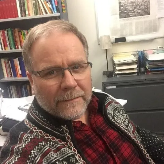 History professor Glen Ryland lends a helping hand around Calgary