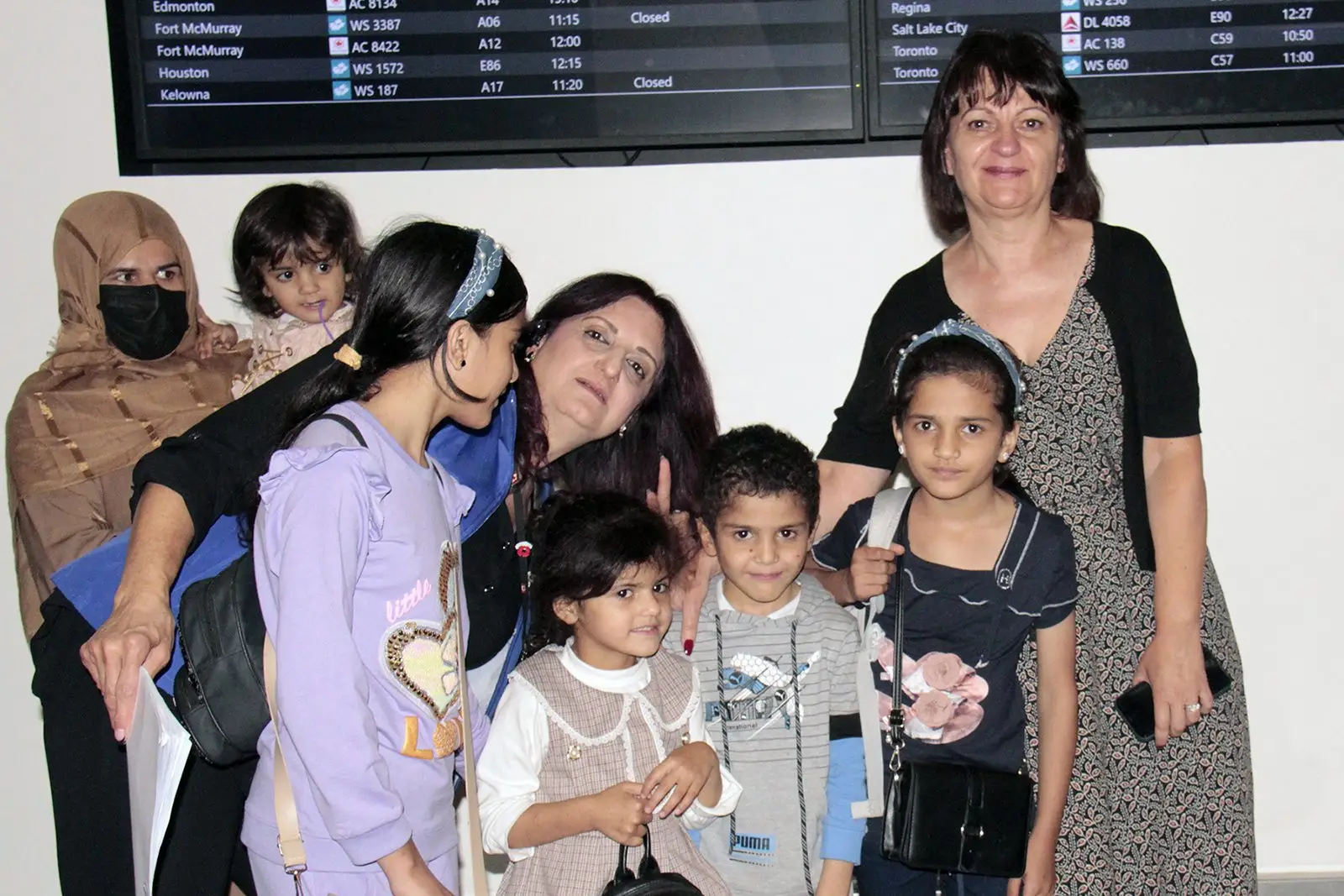 Gordana welcoming refugee children at the Calgary International Airport (YYC)